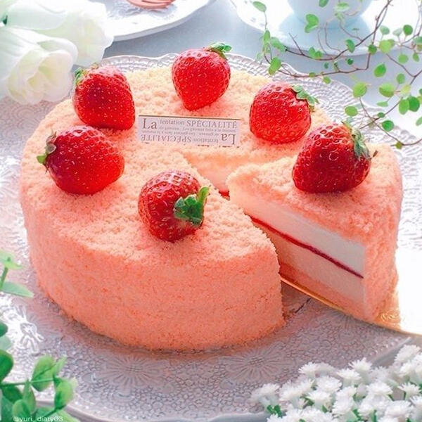 Strawberry Custard Cake - House made fresh strawberry custard in layers of angel cake and fresh house made strawberry jam topped with fresh strawberries and coated in a strawberry crumble.