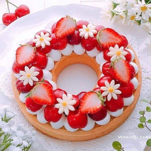 Strawberry Flatcake ~ A thin soft pound cake topped with fresh house-made whipped cream, fresh cut strawberries and handmade sugar strawberry flowers.